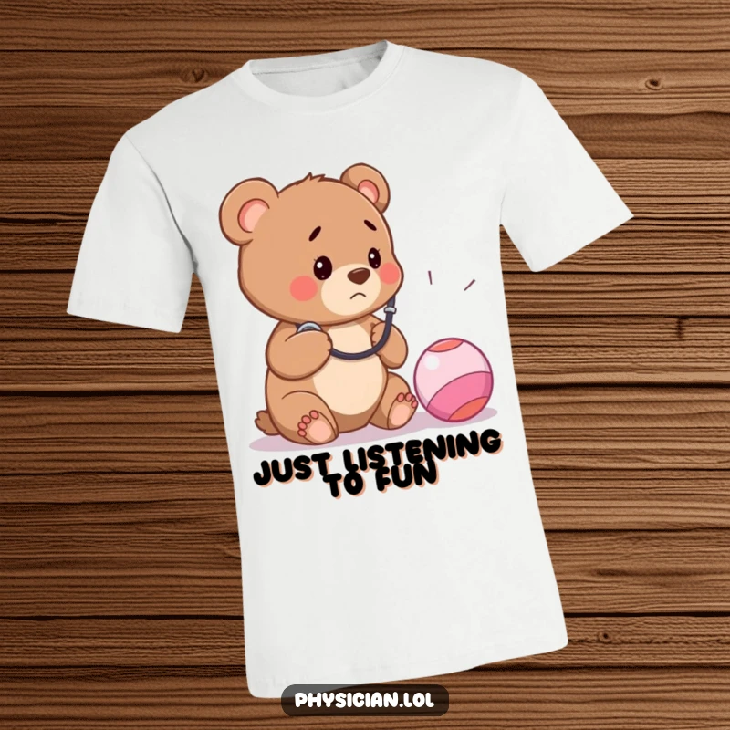 Funny t-shirt graphic of a concerned bear cub doctor using a stethoscope on a bouncy ball, showcasing animal humor and a playful doctor theme.